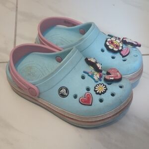 CROCS Kids Blue and Pink Clogs with Fun Charms
